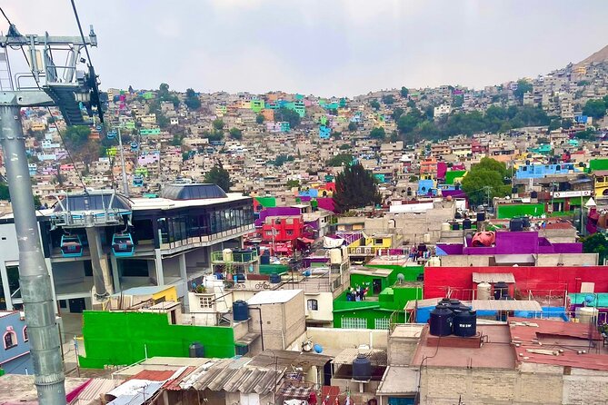 Fly over to the Unexplored Parts of CDMX by Cable Car - Stop 3: Mercado Quetzalcoatl (30 minutes) for tacos + mural spotting