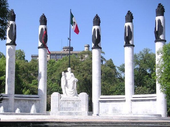 Mexico City E-Bike Tour with a taco and churros stop - Revolution Monument, Alameda Central, and Bellas Artes from the bike lane