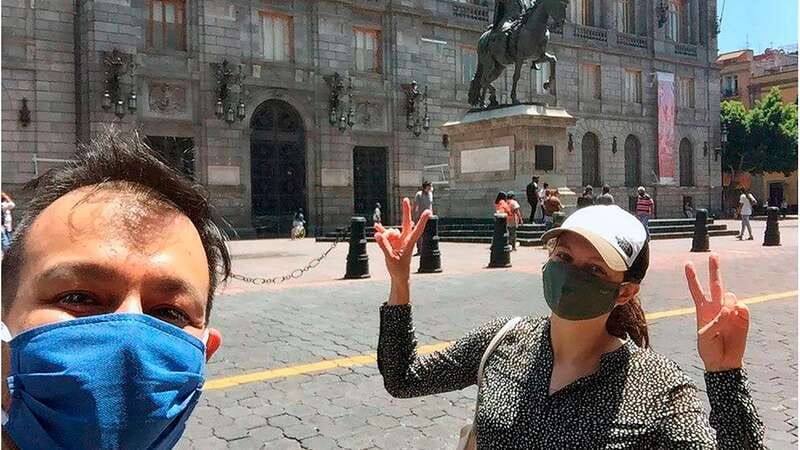 Mexico City: Historic Downtown Walking Tour - Standing by Aztec ruins: Tenochtitlan meets modern streets