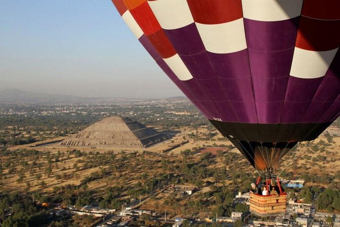 Teotihuacan Hot Air Balloon Ride with Optional Bike or Walking Tour - A mural neighborhood and a cave observatory