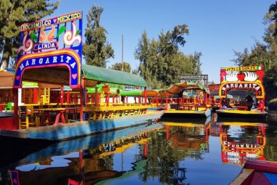 Xochimilco, Coyoacan, Aztec Stadium & UNAM - Ciudad Universitaria (UNAM): murals, big architecture, and what 1 hour buys you